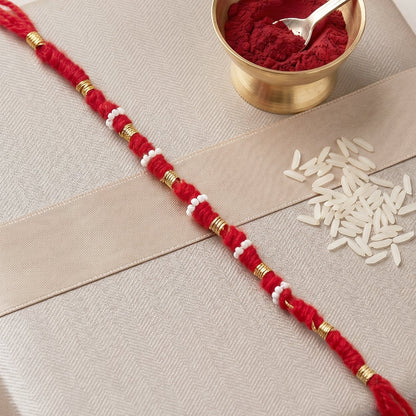 Handmade Red Bracelet Rakhi with White Beads (1 Pc)